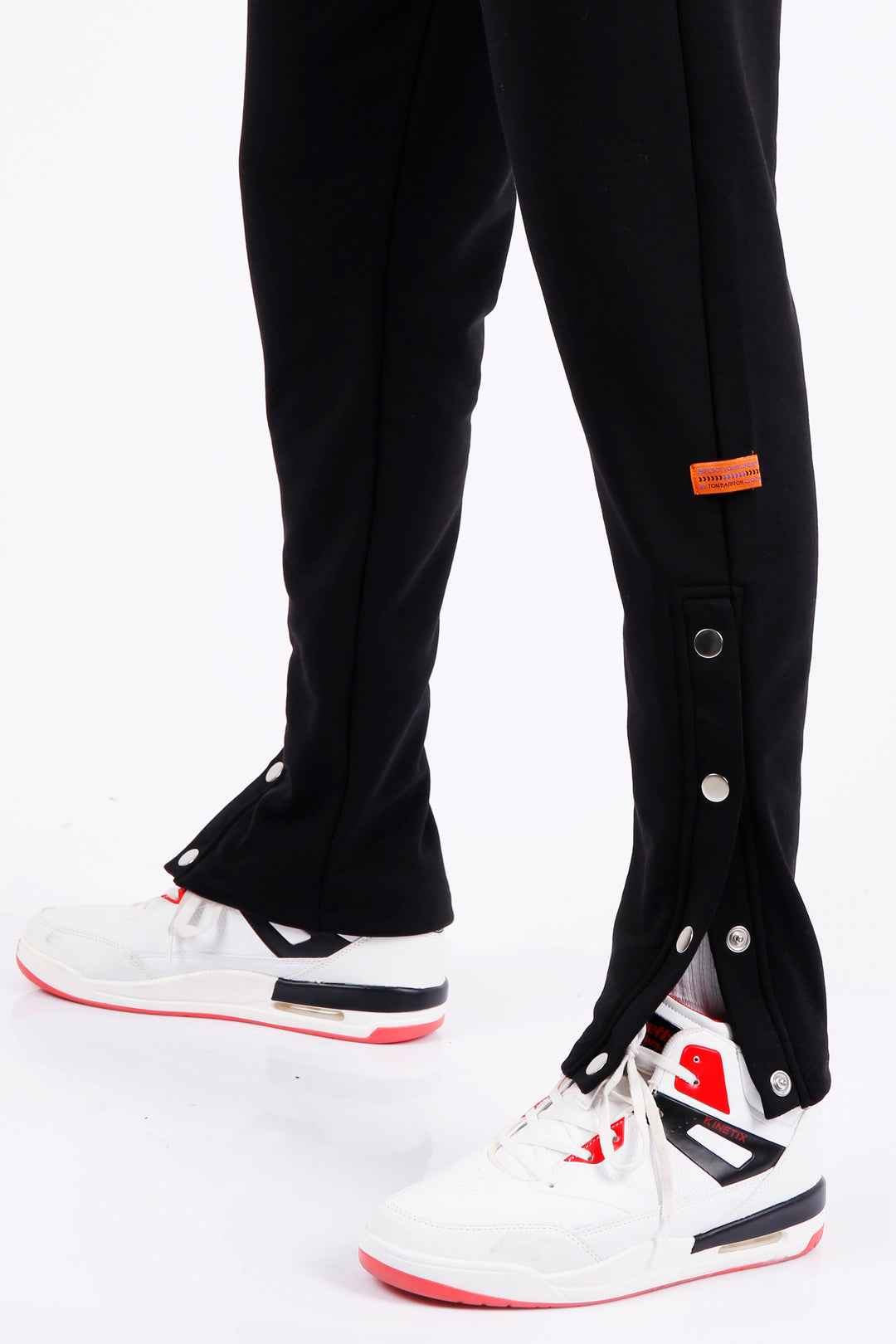 Pantaloni della tuta con bottoni automatici laterali